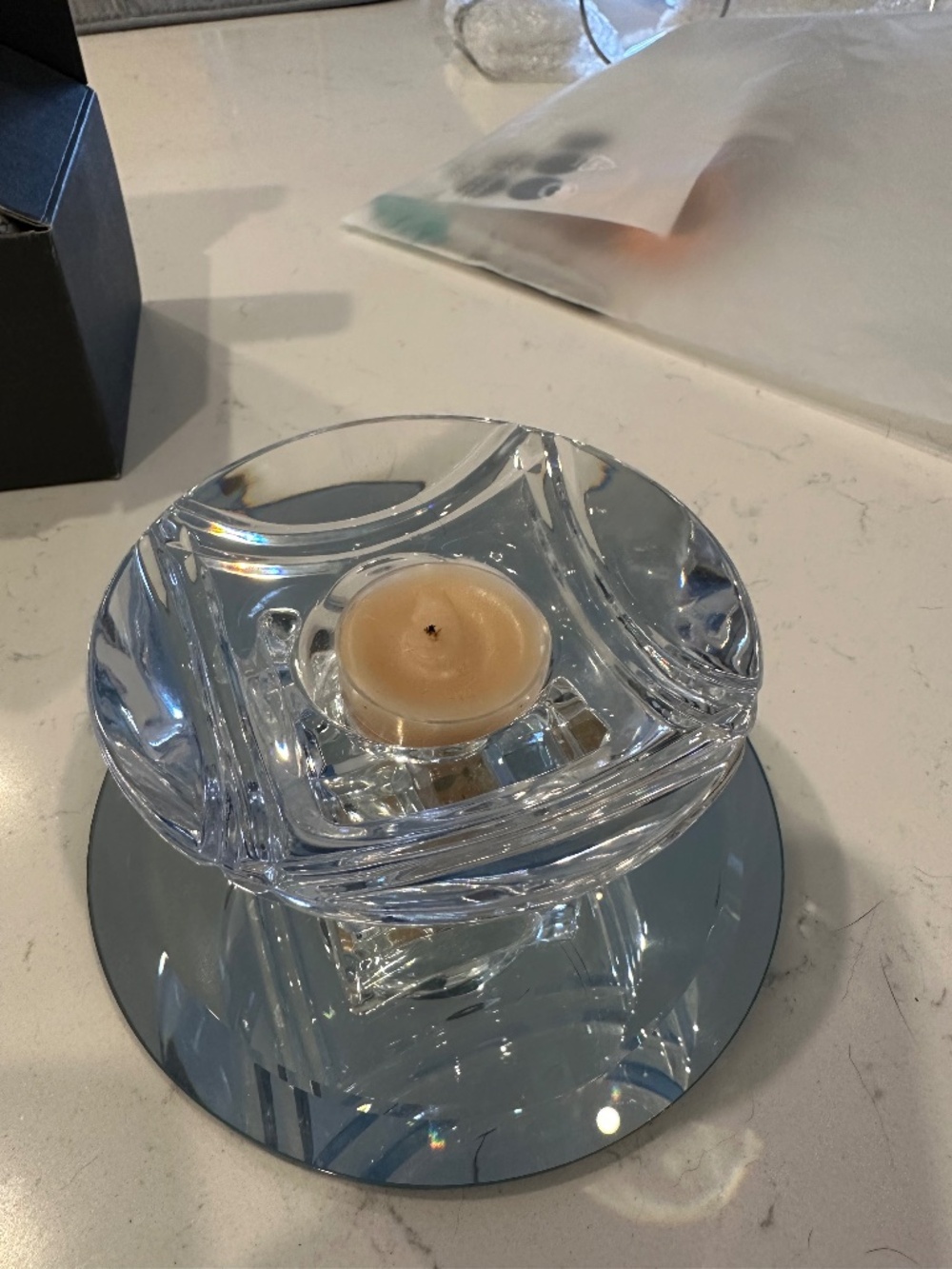 Waterford Equalux votive with candle.